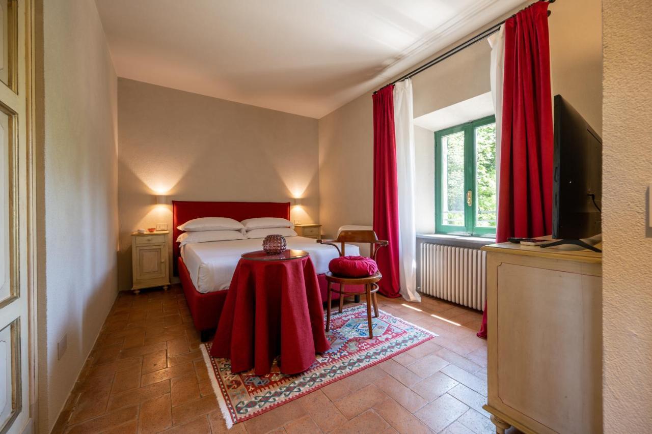Отель Palazzo Viviani Castello Di Монтегридольфо Экстерьер фото